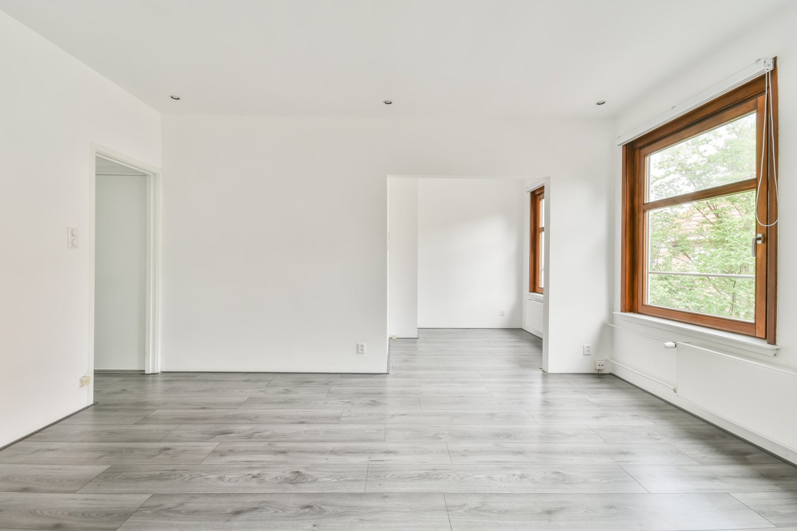 The interior of a white room with windows