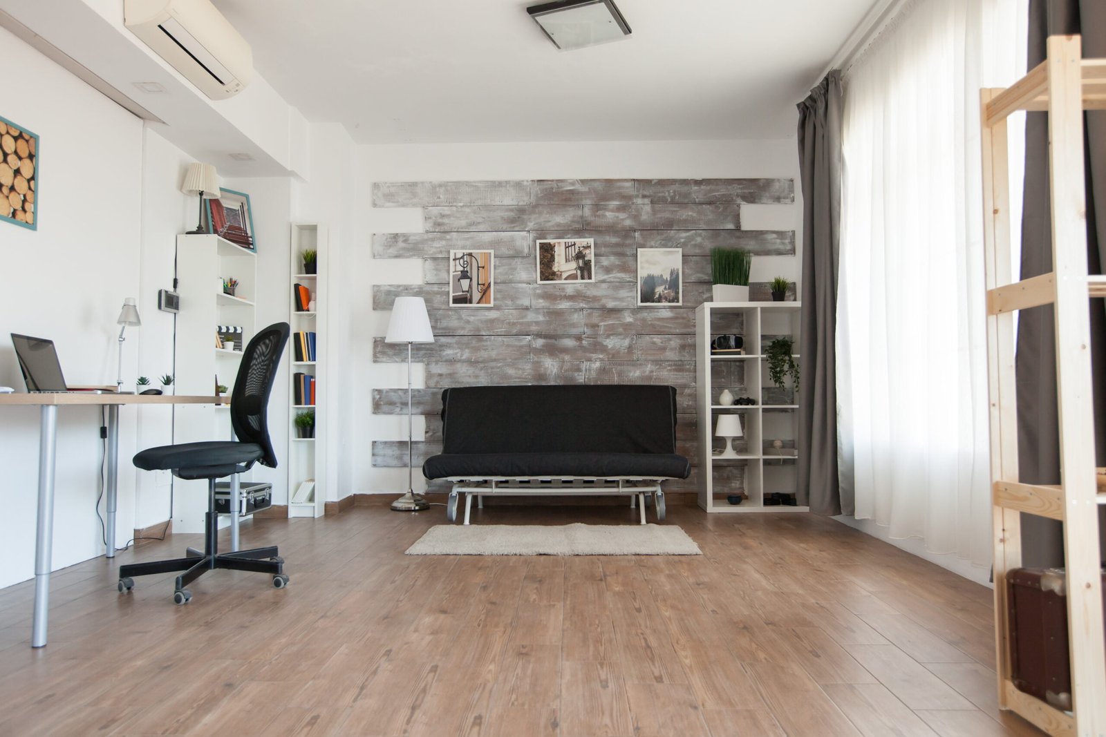 Living room with nobody in it. Modern furniture in cozy apartment. Relaxing athmosphere in empty apartment.